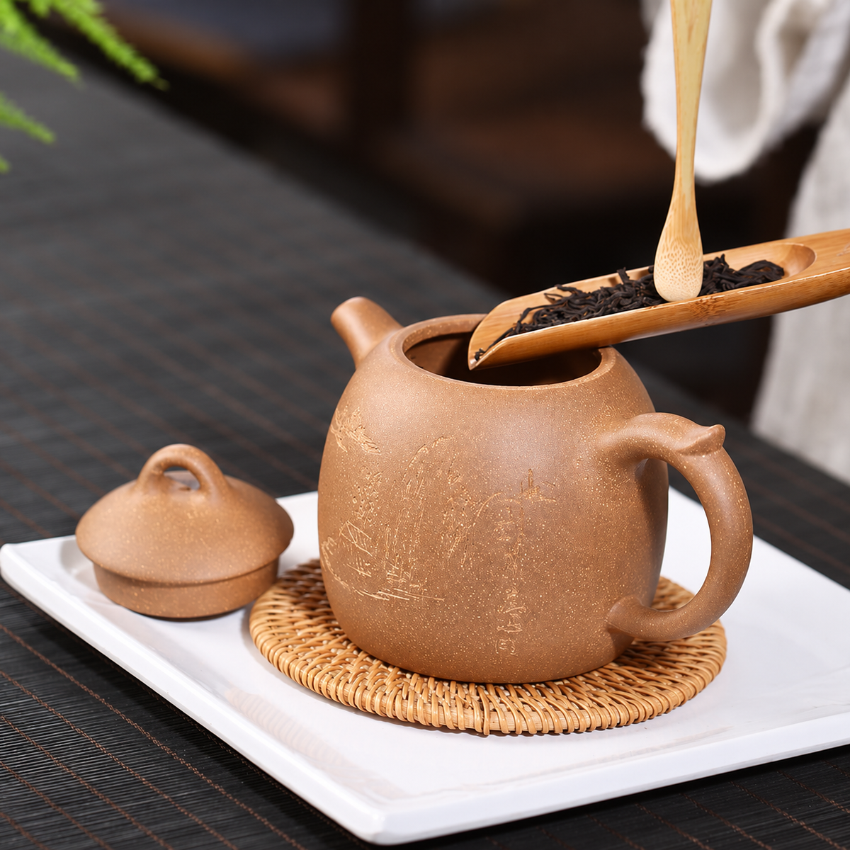 Landscape-Engraved Brown Ceramic Teapot — image 1