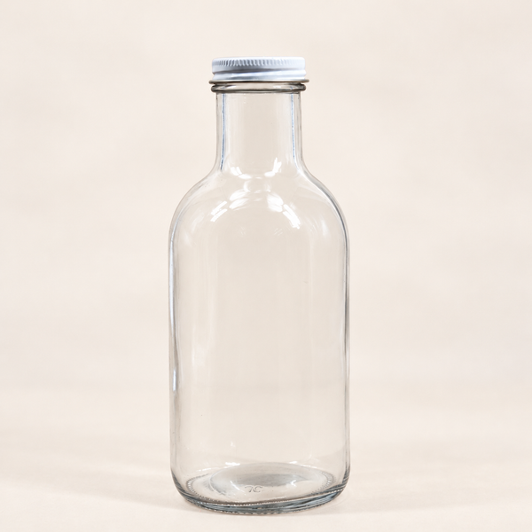 Clear Glass Beverage Bottle