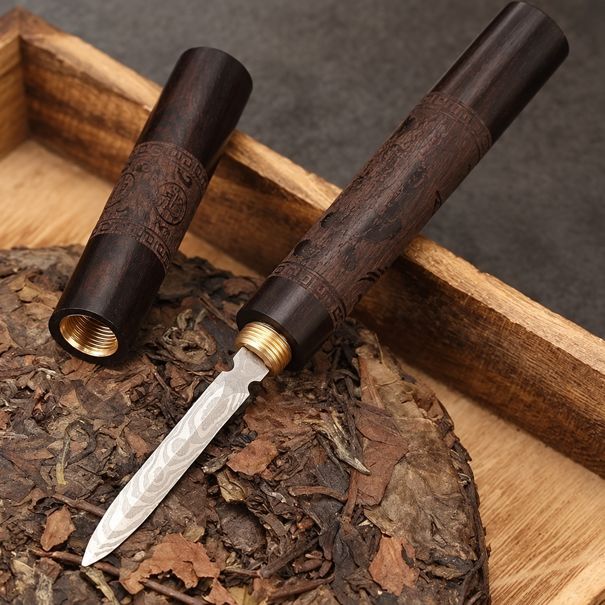 A tea knife and its matching cover.