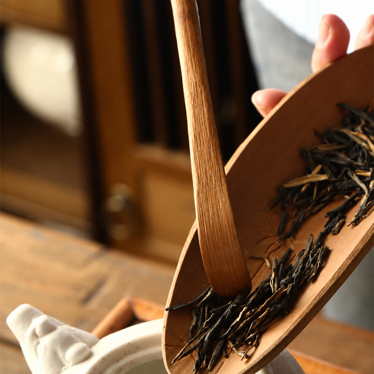 Guide loose leaves gently.