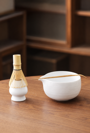 Four pictured tea tools