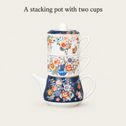 A stacking pot with two cups