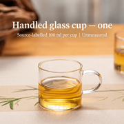 Handled glass cup — one