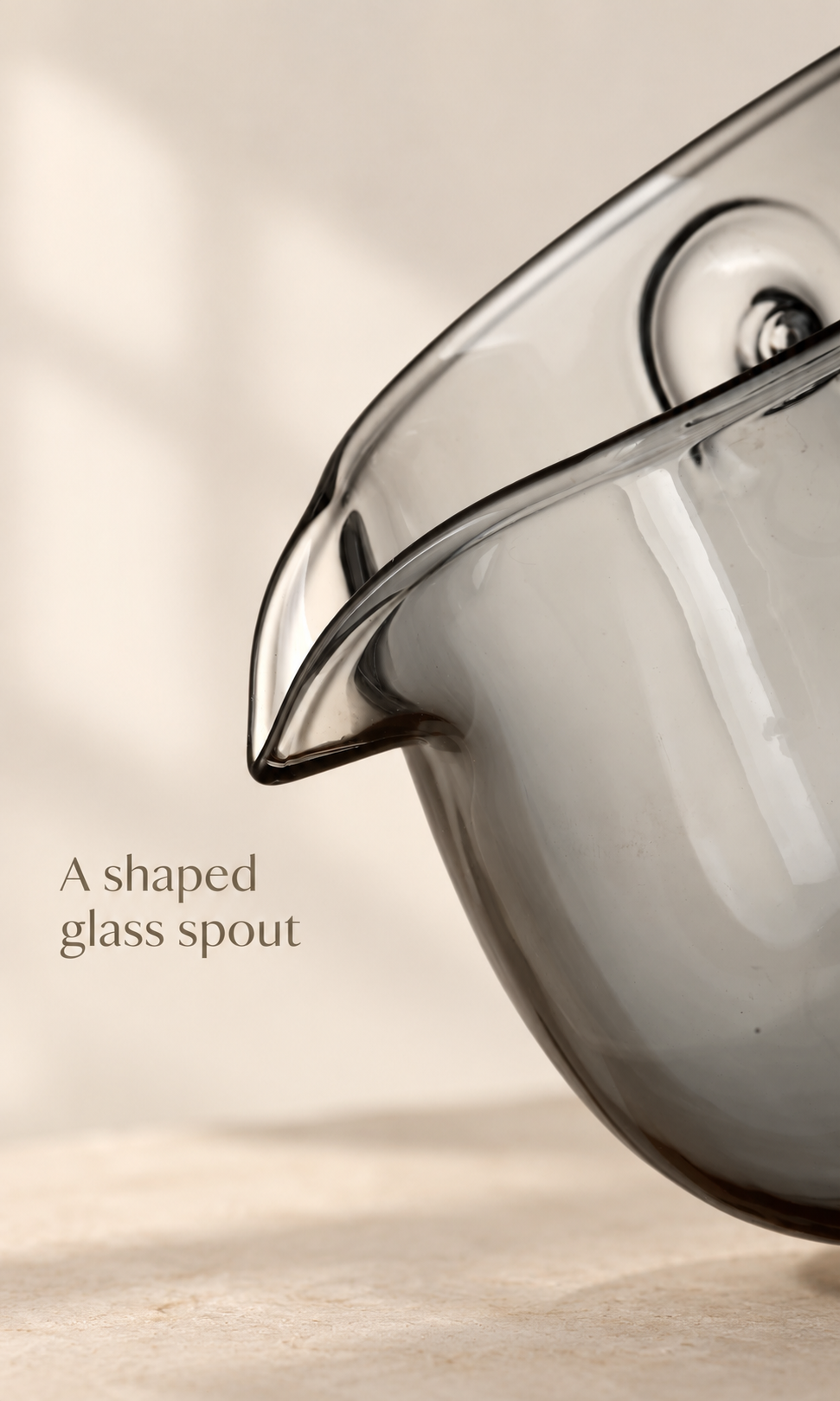 A shaped glass spout