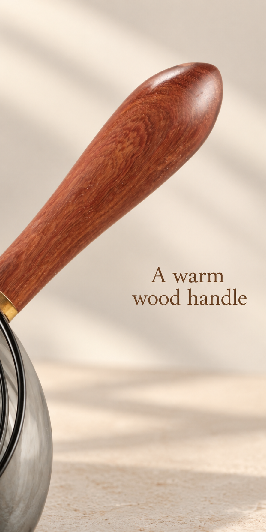 A warm wood handle