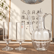 Glass ewer + 2 stem glasses