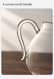 A curved scroll handle