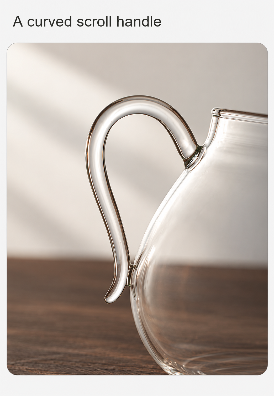A curved scroll handle