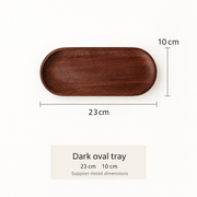 Dark oval wooden tray