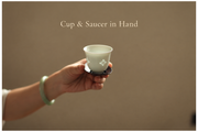 Cup & Saucer in Hand