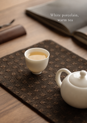 White porcelain, warm tea