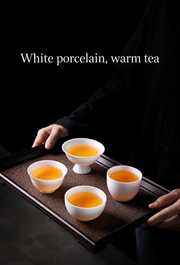 White porcelain, warm tea