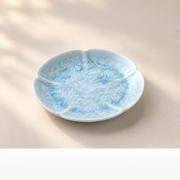 Flower-profile saucer