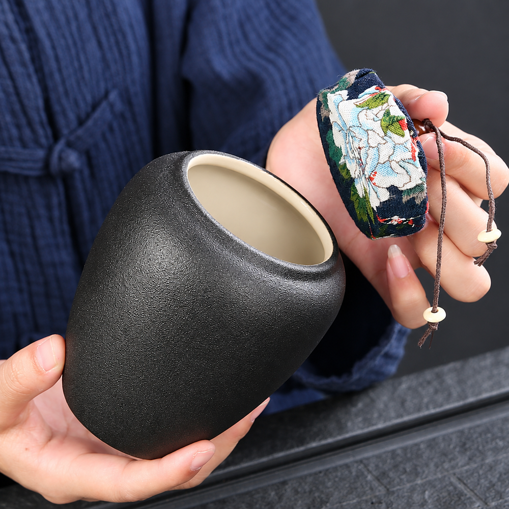 Textured Ceramic Tea Jar with Patterned Lid - source image 2