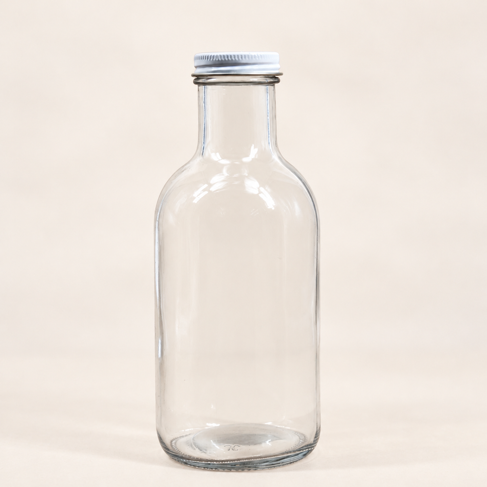 Clear Glass Beverage Bottle — image 1